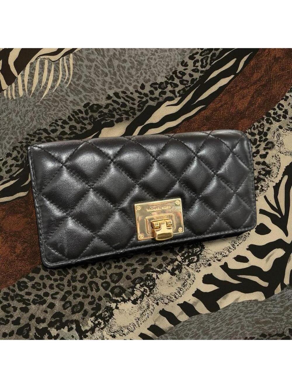 black quilted michael kors clutch